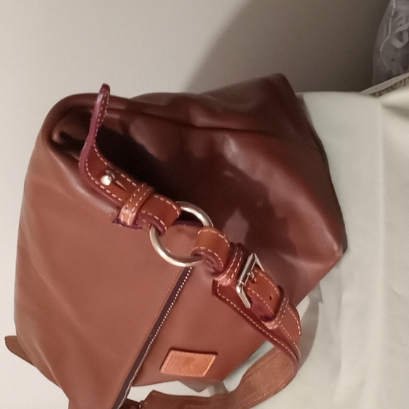 Dooney & Bourke Smooth Genuine Leather    Handbag. Color is a  Rich Caramel. - Picture 3 of 16